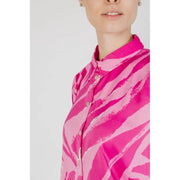 A vibrant pink and fuchsia zebra-striped long button-down shirt with a crisp collar for spring and summer women