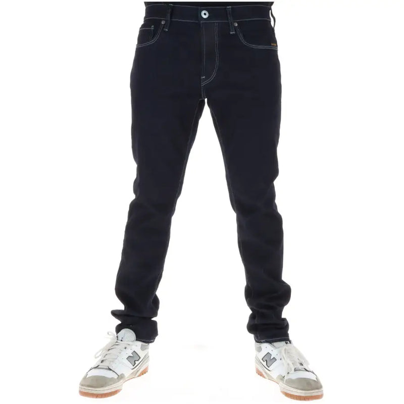 Dunkelindigofarbene G-Star Herrenjeans aus Baumwollstretch mit kontrastierenden weißen Nähten und klassischem Fünf-Taschen-Design mit Knopfleiste