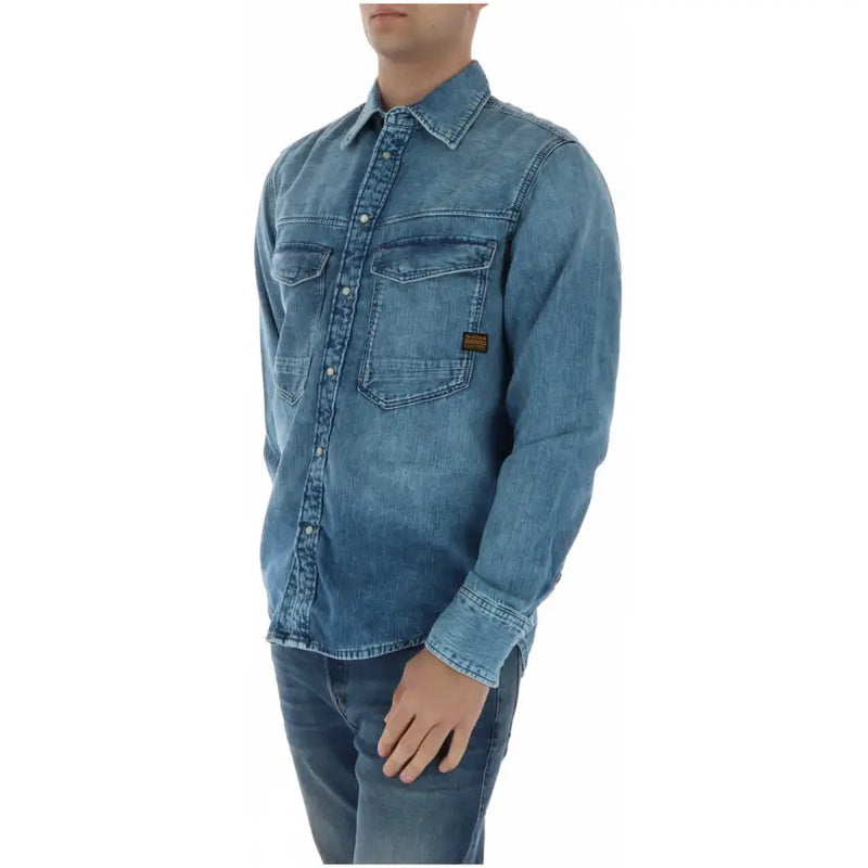 G-Star Herrenhemd aus blauem Denim, langärmelig, mit zwei Brusttaschen und kleinem braunem Label an der linken Tasche