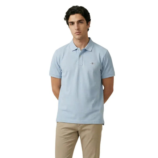 Light blue pique cotton stretch polo shirt for men by gant with small embroidered logo on the left chest