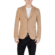 Men’s light brown two-button blazer paired with a white crew neck T-shirt and black drawstring pants