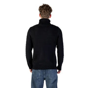 Black turtleneck sweater with ribbed knit design and slim fit.