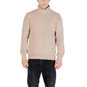 Beige turtleneck sweater with ribbed detailing and slim fit.