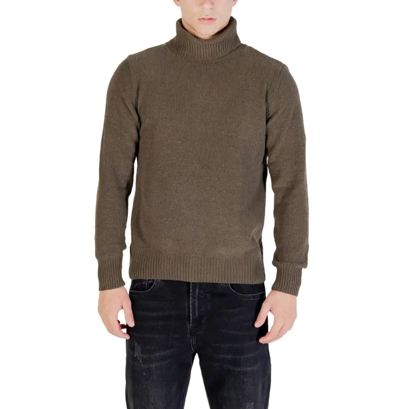 Olive green turtleneck sweater with ribbed texture and cuffs, likely made of wool or cotton blend.
