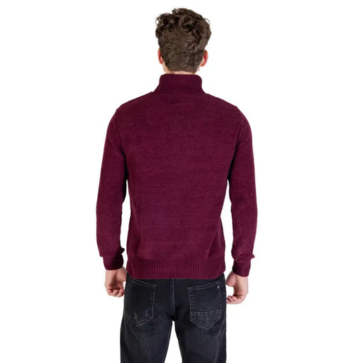 Burgundy turtleneck sweater with ribbed detailing and textured knit design, inspired by a classic menswear style.