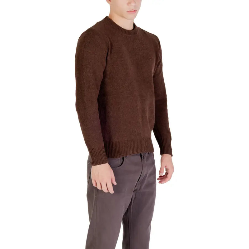 Brown crew neck sweater with ribbed cuffs and hem, likely made of cotton or wool.