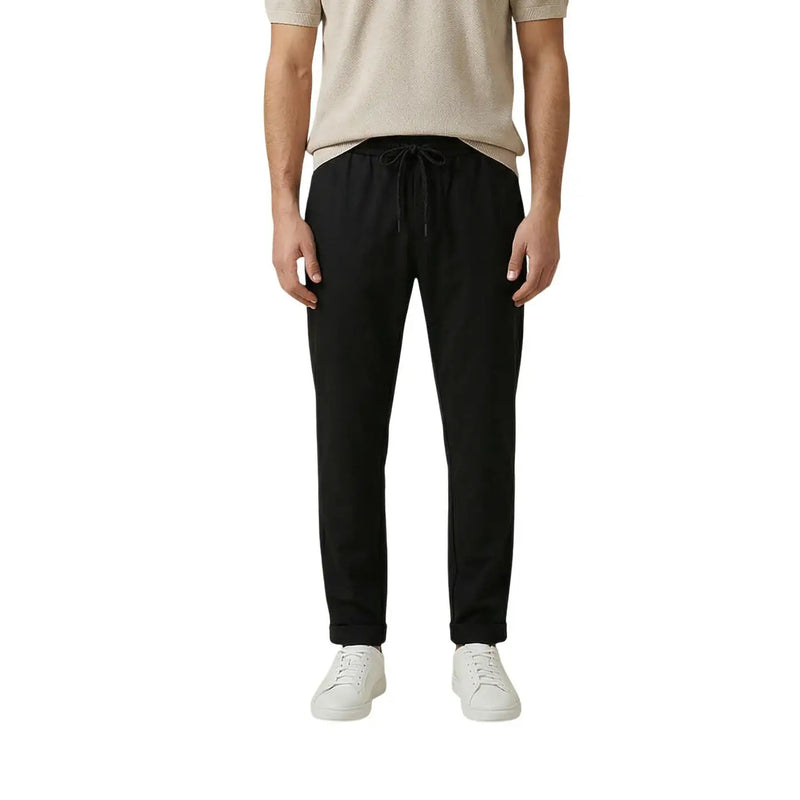 Black drawstring gianni lupo men trousers with relaxed fit and tapered legs suitable for casual wear