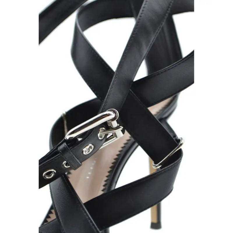 Schwarze Stiletto-Sandalen von Giuseppe Zanotti aus Leder mit silberner Schnalle und Beschlägen sowie Reißverschlussdetails