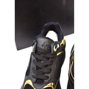 Giuseppe Zanotti black and gold athletic sneaker with mesh and synthetic leather details for men