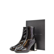 Giuseppe Zanotti women black patent leather ankle boots with glossy finish and chunky block heel front view