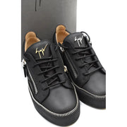 Giuseppe Zanotti women black leather sneakers with gold logo detailing and silver zippers visible from the back side