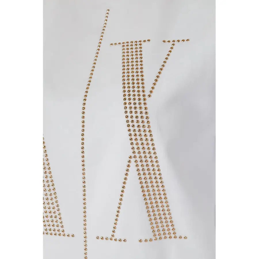 
                      
                        Armani Exchange gold necklace with letter accessory featured on women’s sweatshirt
                      
                    