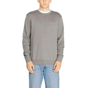 Gray crewneck sweatshirt modeled by a person from Boss Men Knitwear