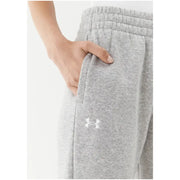 Gray drawstring sweatpants in heathered fabric with a white under armour logo on the side
