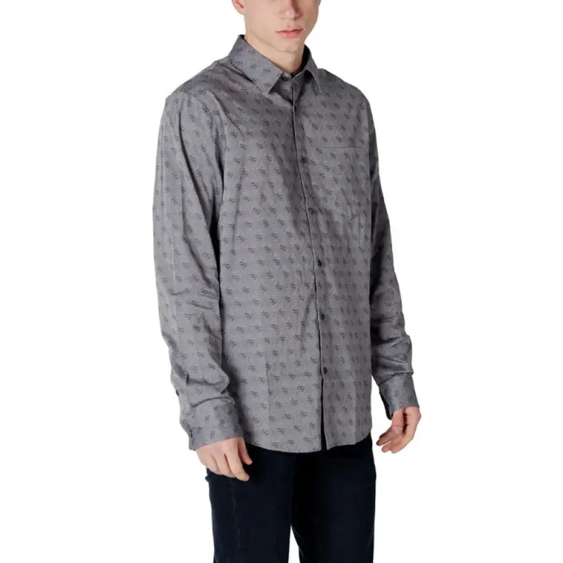 Gray patterned long-sleeved men’s shirt displayed in a product image