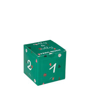 Green Christmas-themed cube showcased in a Christmas Sock Set for festive decor
