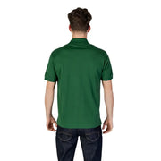 Green Lacoste polo shirt featuring a solid color short sleeves classic collar and neatly stitched seams