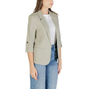 A sleek olive green linen viscose blazer with rolled up three quarter sleeves and a classic collar