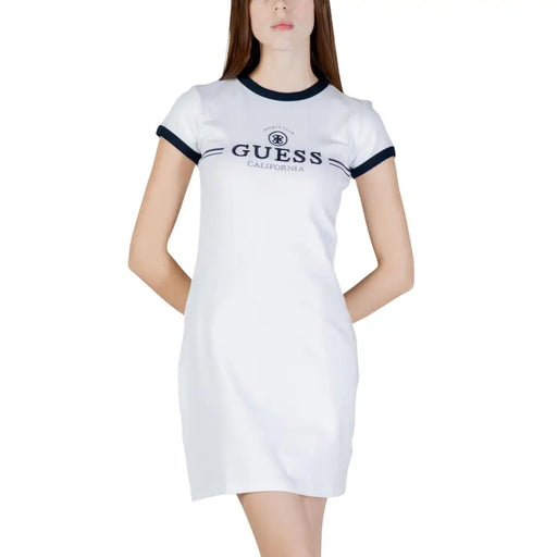 White guess california ringer dress with navy blue trim on neckline and sleeves made of cotton short sleeve fabric