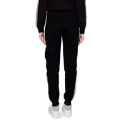 Guess active Schwarze Damen-Jogginghose aus Baumwolle mit weißen Seitenstreifen und dezentem Muster für Herbst und Winter