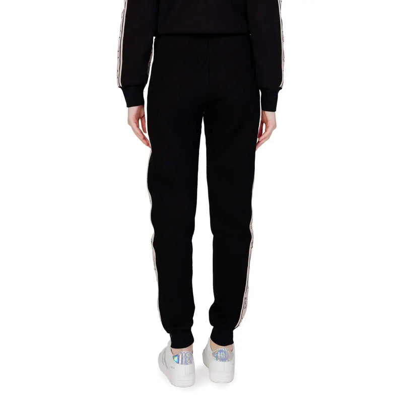 Guess active Schwarze Damen-Jogginghose aus Baumwolle mit weißen Seitenstreifen und dezentem Muster für Herbst und Winter