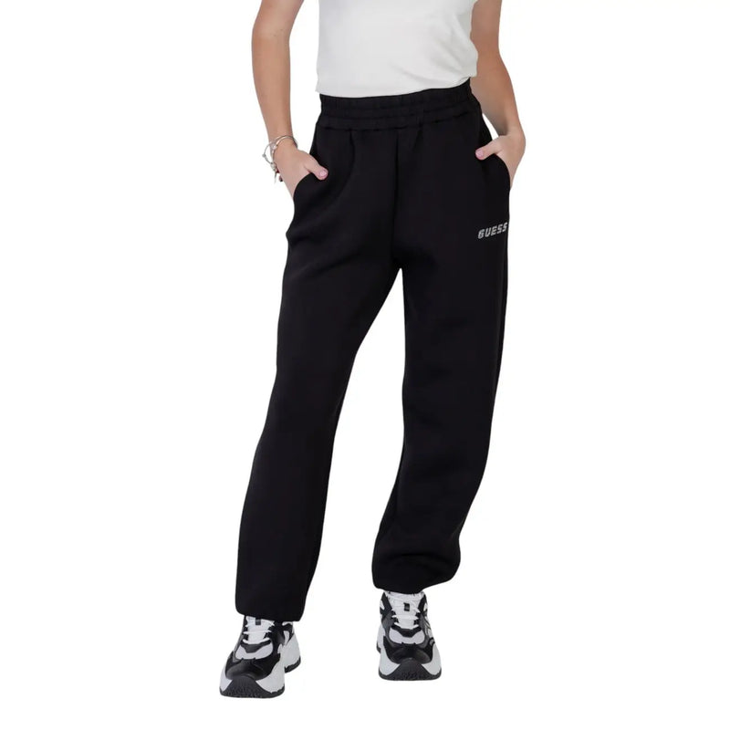 Black guess active women printed trousers with soft fleece material and subtle white logo on the left thigh