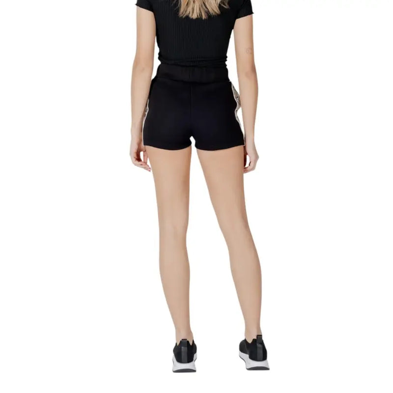 Guess Active Schwarze, gerippte Shorts mit silbernem Pailletten-Seiteneinsatz