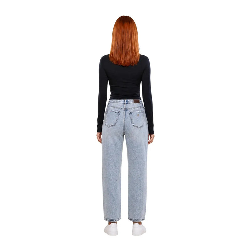 Light-wash denim jeans with high-rise wide-leg cut and classic back pockets shown alongside Guess active women black viscose long sleeve t shirt