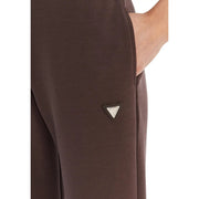 Braun Guess Active Lange Damenhose Olympe aus Modal-Mischgewebe mit dreieckigem Logo-Patch an der Seitennaht