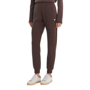 Guess Active Lange braune Jogginghose „Olympe“ für Damen aus weichem, dehnbarem Modal-Mischgewebe mit dezentem dreieckigem Logo am Oberschenkel
