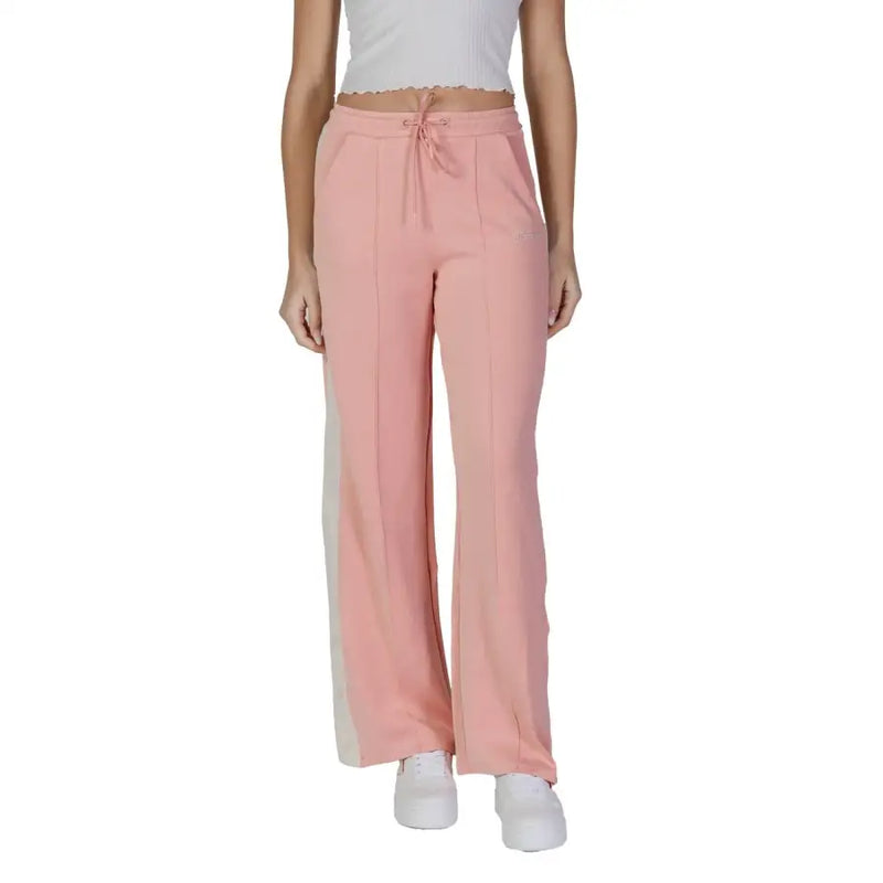 Guess Active women’s pink wide-leg sweatpants with drawstring waistband front pockets and subtle side stripes