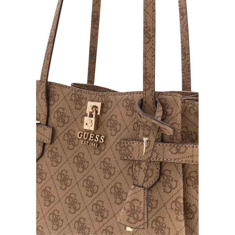 Brown guess tote bag with repeating logo pattern and gold-tone lock closure from spring summer collection
