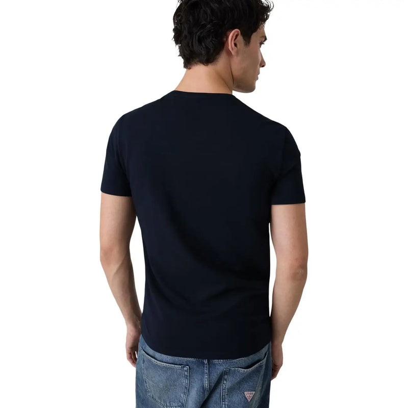 Rückansicht von guess Schwarzes Herren-T-Shirt aus Baumwolle, extra schmal geschnitten, mit Rundhalsausschnitt und dezentem Logo im unteren Rückenbereich.