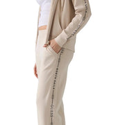 Beige Guess Damen-Jogginghose aus Modal-Mischgewebe mit schwarzem vertikalem Muster north sails Markenlogos entlang der Seitennähte
