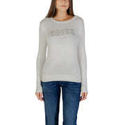 Light gray women’s long-sleeved sweater with sparkling GUESS logo and rhinestone embellishments