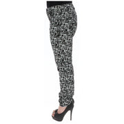 Guess Schwarze Damen-Baumwollhose in schmaler Passform mit abstraktem schwarz-weißem Strukturmuster und Taschen, Größe W0BA46