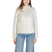 Women’s white puffer jacket with front zipper and triangular emblem, part of Guess Women’s collection
