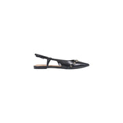 Black leather slingback flat shoe with pointed toe and metallic studs along the vamp by Guess women synthetic