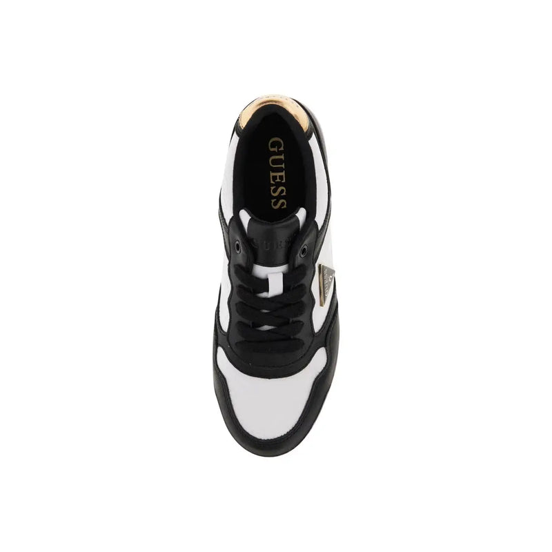 Black and white Guess women sneaker with gold-tone branding accents made of polyurethane material