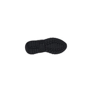 Black rubber sole with textured triangular tread pattern on the back of Guess women black sporty slip on sneakers
