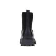 Black leather Guess women chelsea boot with chunky rubber sole and embossed logo detailing in FIDA style