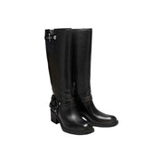 Guess women black knee-high boots made of polyurethane with block heels and silver buckle accents for winter wear
