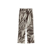 Guess Damen-Viskosehose mit weitem Bein in Braun, Schwarz und Creme mit auffälligem abstraktem Blattmuster aus der Frühjahr/Sommer-Kollektion