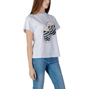 White cotton Guess women t shirt with black and white striped popcorn bucket graphic and silver rhinestone embellishments