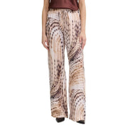 Guess Dalia Damen-Jogginghose, beige Lyocell, weit geschnitten, mit fließendem, abstraktem Tiermuster in Beige und Braun.