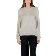 Woman wearing Guess Women Fall Winter Beige Round Neck Knit Sweater and black pants