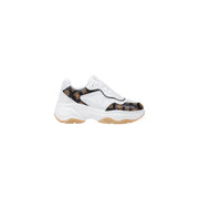 White and brown patterned chunky slip-on sneakers with thick white sole and tan tread