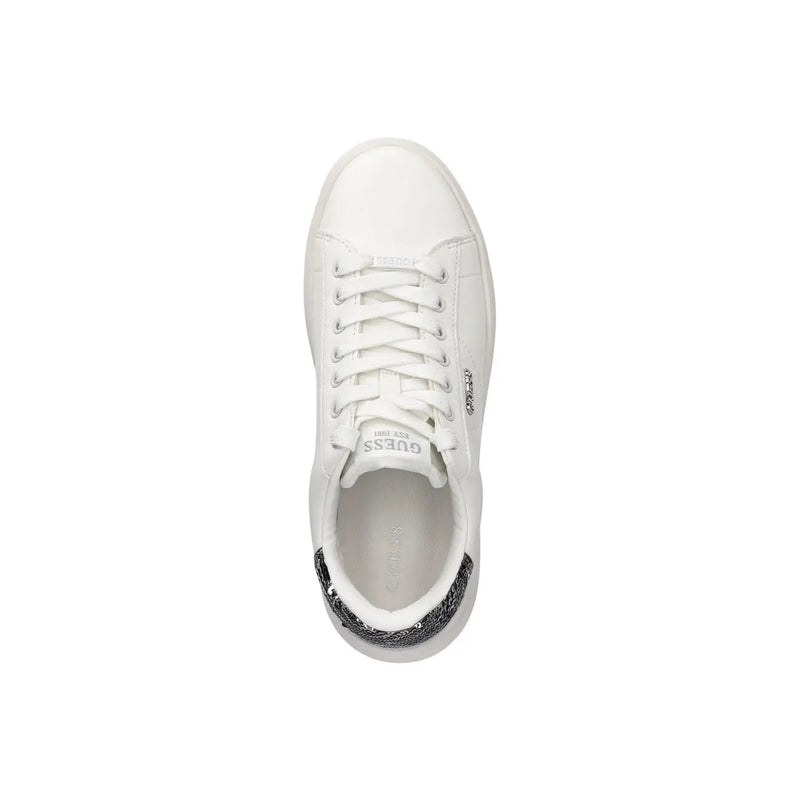 White guess women leather sneakers with glossy upper white laces and black sequined heel tab shown from back side