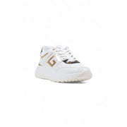 Guess women white leather platform sneakers with gold and black accents featuring a bold geometric logo on the side