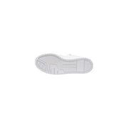 Back side of guess women white polyurethane sneakers lace up showing white rubber sole with puma logo and textured grip